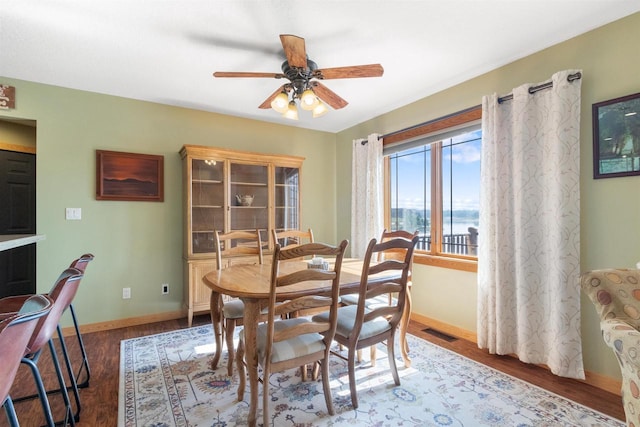 N8092 15th Ave, New Lisbon, WI 53950 - dining space with ceiling fan, baseboards, and wood finished floors