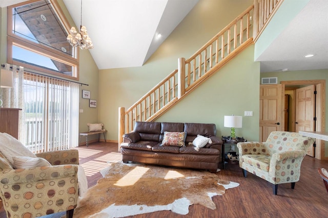 N8092 15th Ave, New Lisbon, WI 53950 - living room with high vaulted ceiling, wood finished floors, a chandelier, recessed lighting, and stairway