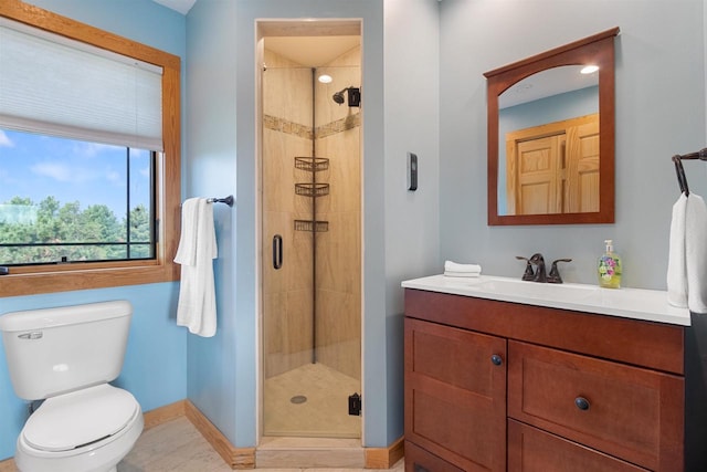 N8092 15th Ave, New Lisbon, WI 53950 - full bath featuring toilet, a shower stall, vanity, and baseboards