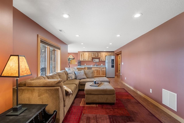 N8092 15th Ave, New Lisbon, WI 53950 - living room with baseboards, wood finished floors, and recessed lighting