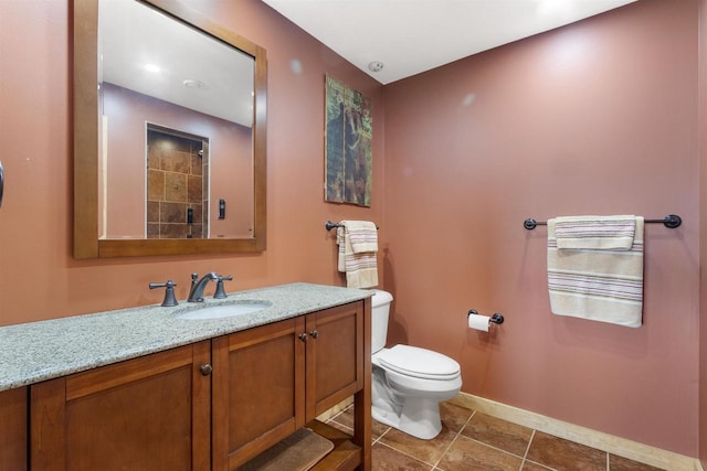 N8092 15th Ave, New Lisbon, WI 53950 - full bathroom featuring toilet, vanity, baseboards, and tile patterned flooring