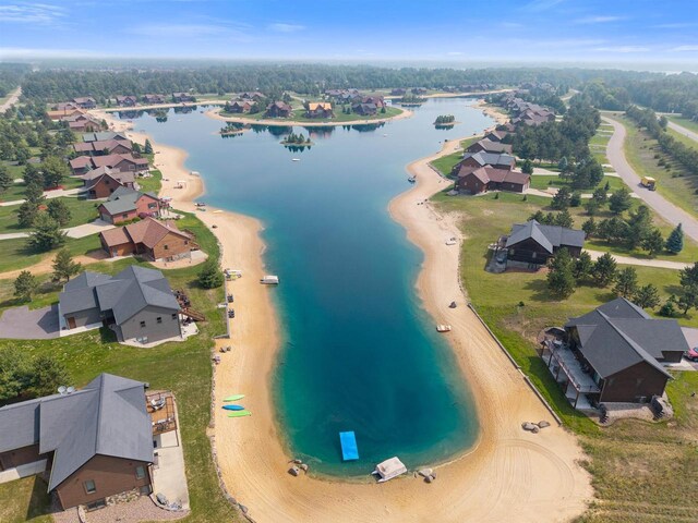 N8092 15th Ave, New Lisbon, WI 53950 - aerial overview of property's location featuring a nearby body of water and nearby suburban area