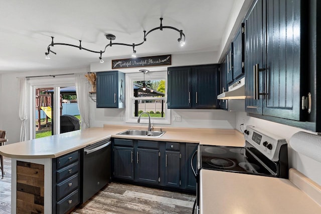 2127 Jen Rae Rd, Green Bay, WI 54311 - kitchen with dishwashing machine, a sink, a peninsula, under cabinet range hood, and stainless steel range with electric stovetop