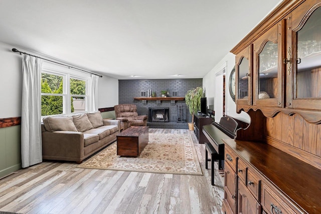 2127 Jen Rae Rd, Green Bay, WI 54311 - living room featuring a fireplace and light wood-type flooring