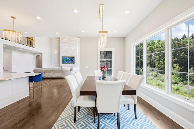 10031 N Range Line Rd, Mequon, WI 53092 - dining space featuring dark wood-style flooring, a chandelier, and recessed lighting