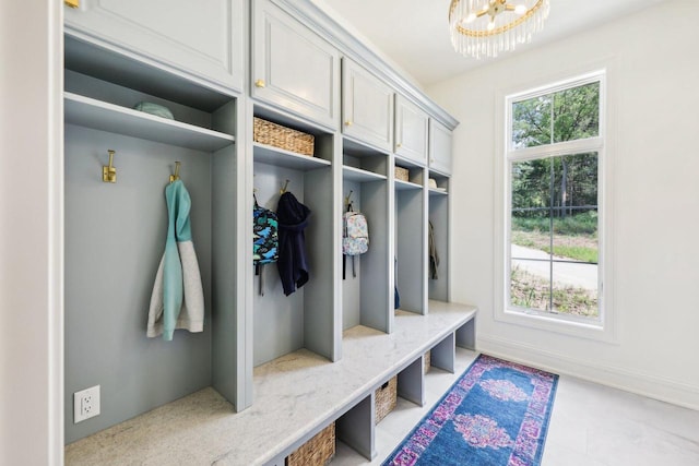 10031 N Range Line Rd, Mequon, WI 53092 - mudroom with a chandelier