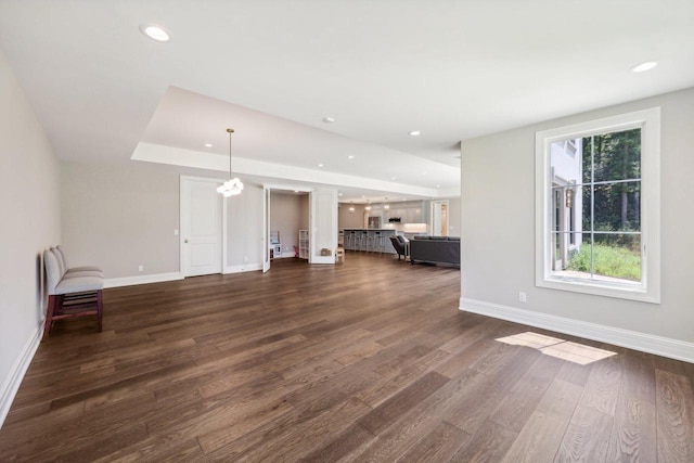 10031 N Range Line Rd, Mequon, WI 53092 - unfurnished living room featuring dark wood finished floors, recessed lighting, and a chandelier