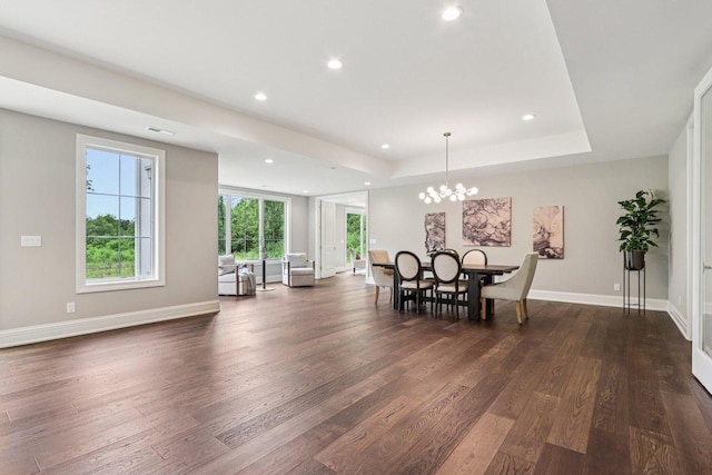 10031 N Range Line Rd, Mequon, WI 53092 - dining area featuring dark wood-style flooring, a chandelier, recessed lighting, and a raised ceiling