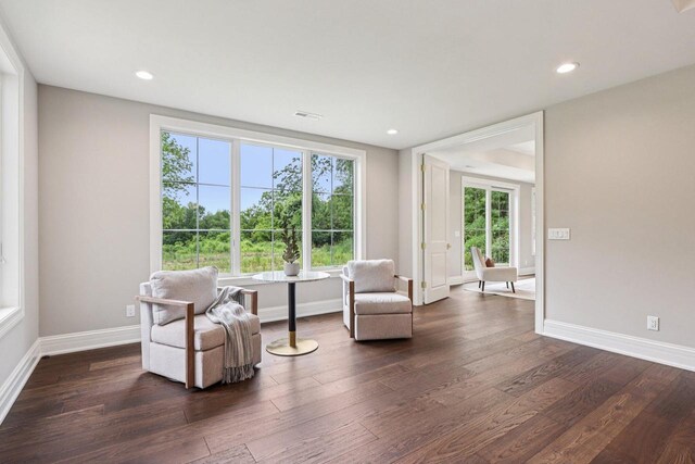 10031 N Range Line Rd, Mequon, WI 53092 - living area with dark wood-style flooring and recessed lighting
