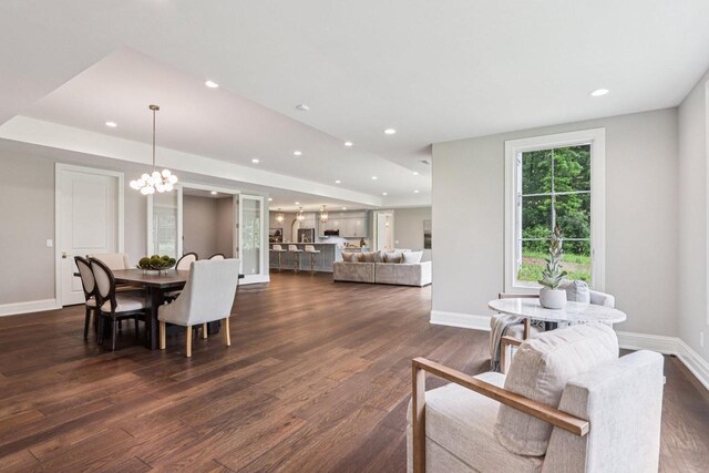 10031 N Range Line Rd, Mequon, WI 53092 - dining area featuring dark wood-style flooring, a chandelier, and recessed lighting