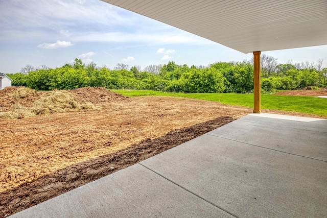2590 N Stellita Cir, De Pere, WI 54115 - view of green lawn with a patio area