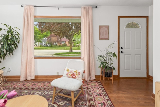 W62N322 Hanover Ave, Cedarburg, WI 53012 - sitting room featuring wood finished floors and baseboards