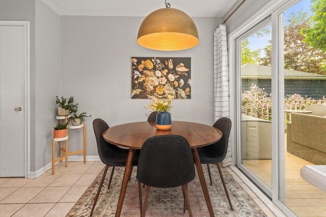 W62N322 Hanover Ave, Cedarburg, WI 53012 - dining space featuring light tile patterned floors and baseboards