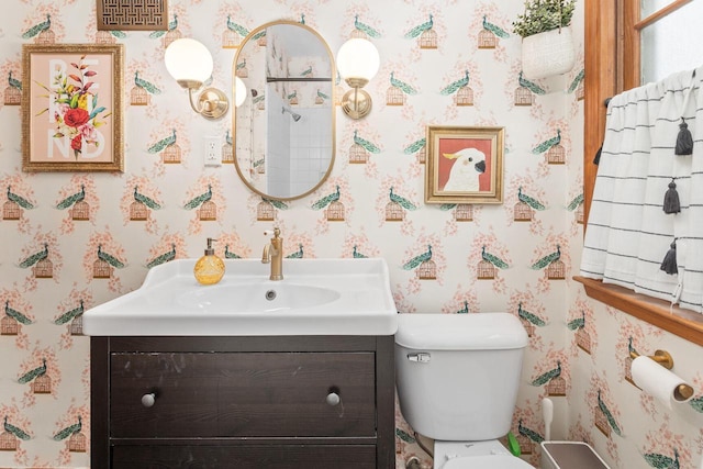 W62N322 Hanover Ave, Cedarburg, WI 53012 - bathroom with wallpapered walls, vanity, and toilet