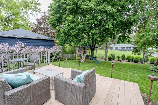 W62N322 Hanover Ave, Cedarburg, WI 53012 - wooden terrace featuring a playground and an outdoor hangout area