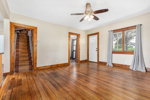 N3438 State Rd 76, Hortonville, WI 54944 - unfurnished living room with ceiling fan, hardwood / wood-style floors, baseboards, and stairway