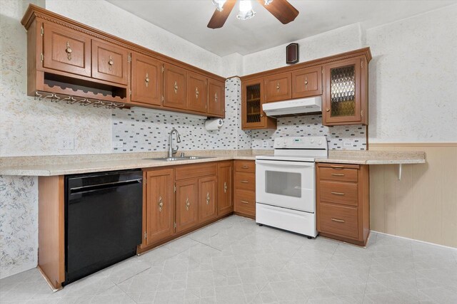 8511 W Orchard St, West Allis, WI 53214 - kitchen featuring white range with electric cooktop, dishwasher, under cabinet range hood, a sink, and a ceiling fan