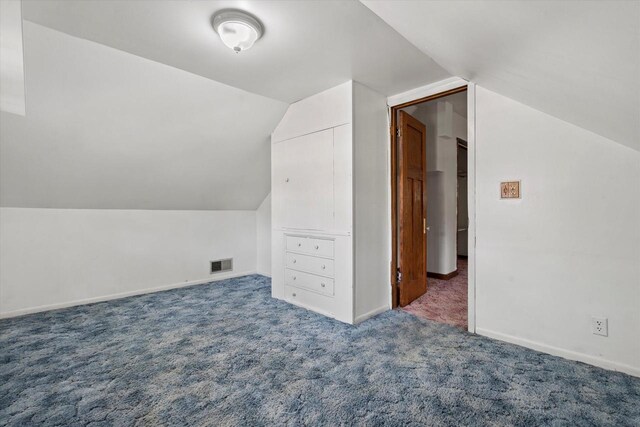 8511 W Orchard St, West Allis, WI 53214 - bonus room featuring carpet, lofted ceiling, and baseboards