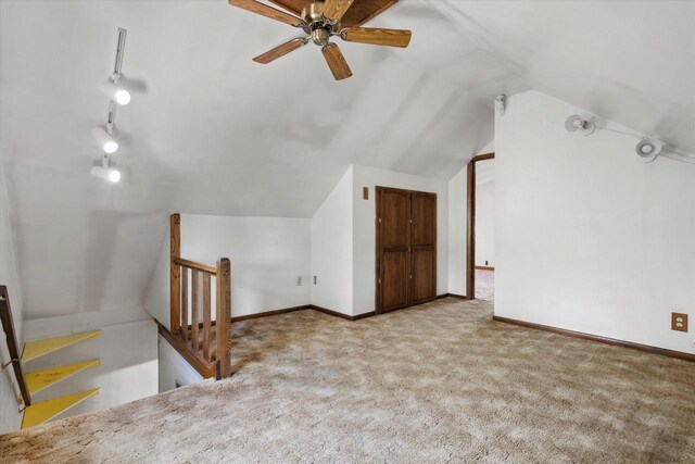 8511 W Orchard St, West Allis, WI 53214 - bonus room with vaulted ceiling, carpet floors, a ceiling fan, and baseboards