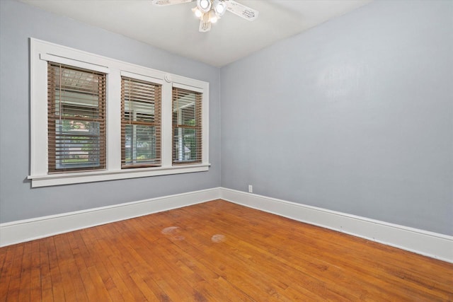 8511 W Orchard St, West Allis, WI 53214 - spare room featuring baseboards, a ceiling fan, and hardwood / wood-style flooring