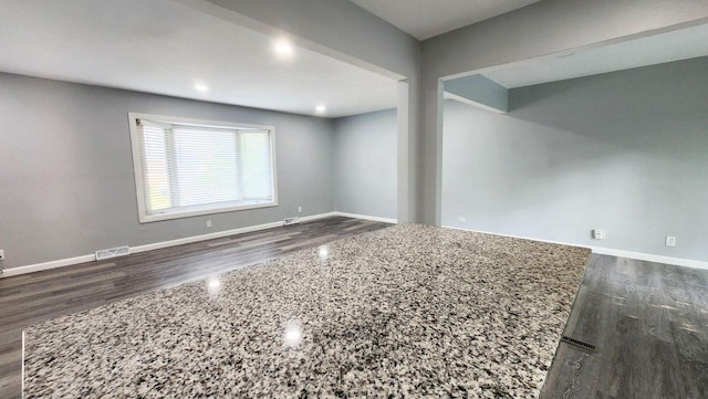 9085 N Joyce Ave, Milwaukee, WI 53224 - empty room with dark wood-style floors and baseboards