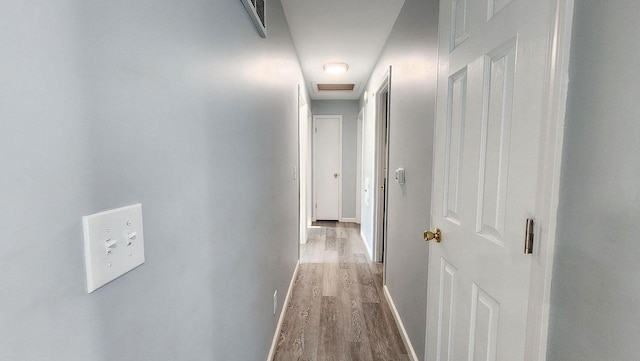 9085 N Joyce Ave, Milwaukee, WI 53224 - corridor featuring wood finished floors and baseboards