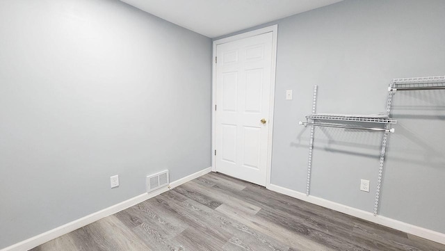 9085 N Joyce Ave, Milwaukee, WI 53224 - spare room featuring wood finished floors and baseboards