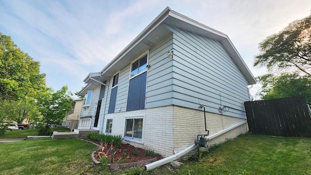 9085 N Joyce Ave, Milwaukee, WI 53224 - view of home's exterior featuring a lawn