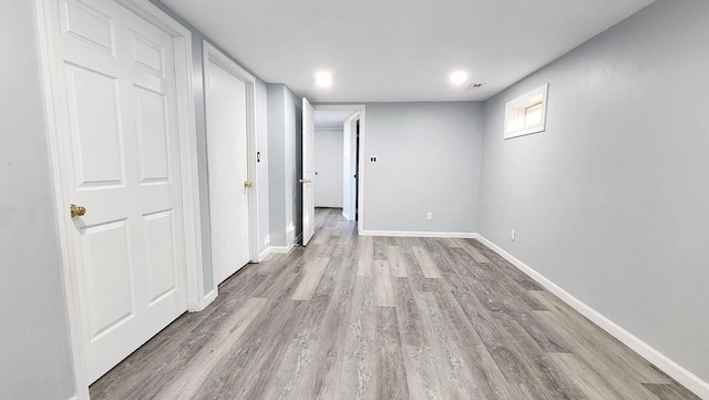9085 N Joyce Ave, Milwaukee, WI 53224 - below grade area with wood finished floors and baseboards