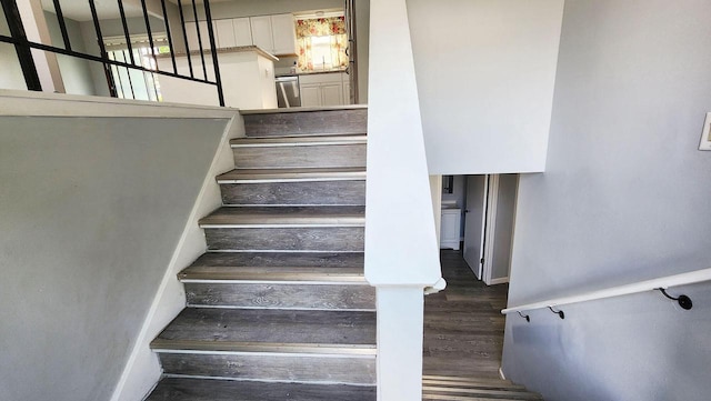 9085 N Joyce Ave, Milwaukee, WI 53224 - staircase with wood finished floors and baseboards