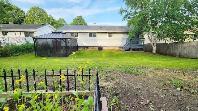 9085 N Joyce Ave, Milwaukee, WI 53224 - back of house with a garden and a gazebo