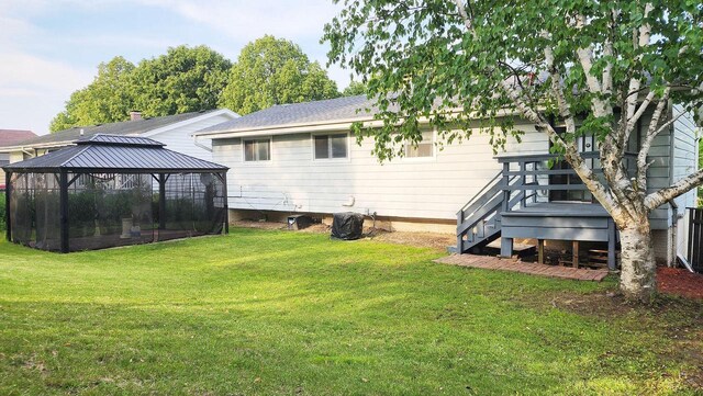 9085 N Joyce Ave, Milwaukee, WI 53224 - back of property featuring a gazebo, a lawn, and cooling unit