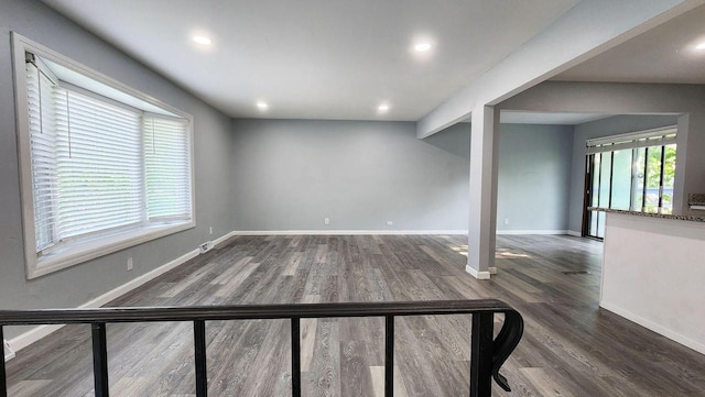 9085 N Joyce Ave, Milwaukee, WI 53224 - unfurnished living room featuring wood finished floors, baseboards, and recessed lighting