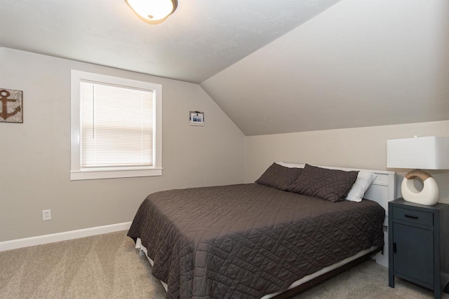 1614 N Richmond St, Appleton, WI 54911 - carpeted bedroom featuring lofted ceiling and baseboards