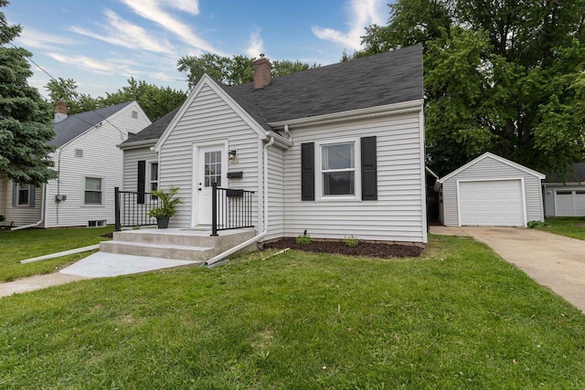 1614 N Richmond St, Appleton, WI 54911 - view of front of property featuring an outbuilding, driveway, a garage, a chimney, and a front yard