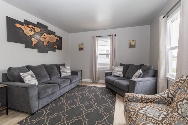 1614 N Richmond St, Appleton, WI 54911 - living room featuring wood finished floors, healthy amount of natural light, and baseboards