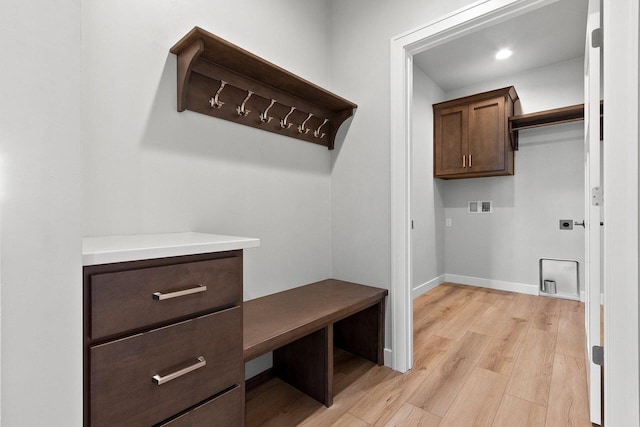 1925 Creekwood Ct, Manitowoc, WI 54220 - mudroom with light wood-style flooring and baseboards