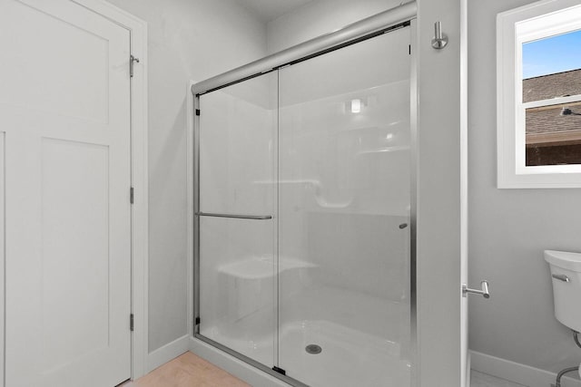 1925 Creekwood Ct, Manitowoc, WI 54220 - full bath featuring baseboards, a stall shower, and toilet