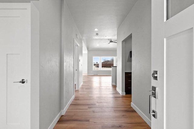 1925 Creekwood Ct, Manitowoc, WI 54220 - corridor with wood finished floors, recessed lighting, and baseboards