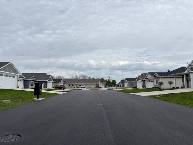 1925 Creekwood Ct, Manitowoc, WI 54220 - view of asphalt street with a residential view