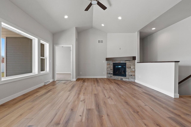 1925 Creekwood Ct, Manitowoc, WI 54220 - unfurnished living room featuring a ceiling fan, light wood-type flooring, recessed lighting, lofted ceiling, and baseboards