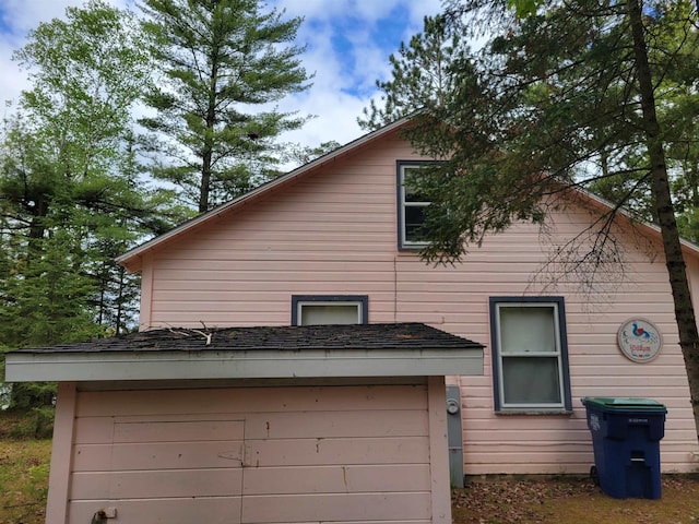 N9221 Sumac Ln, Gresham, WI 54128 - view of side of home featuring a garage