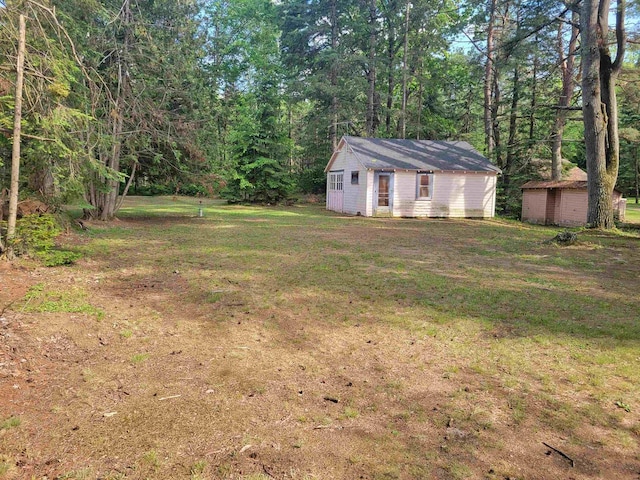 N9221 Sumac Ln, Gresham, WI 54128 - view of grassy yard with a view of trees