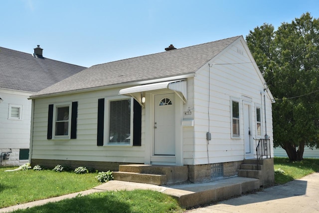 4757 N 21st St, Milwaukee, WI 53209 - bungalow-style home featuring a shingled roof and entry steps