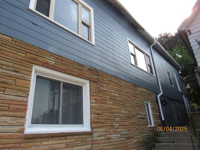 2405 S 5th St, Milwaukee, WI 53207 - view of side of home featuring stone siding