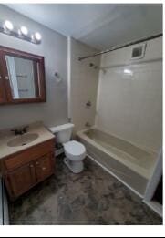 2405 S 5th St, Milwaukee, WI 53207 - bathroom with vanity, toilet, and shower / bath combination