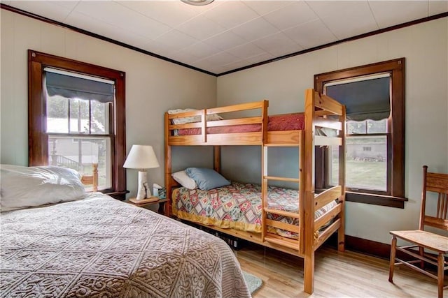 17174 59th Ave, Chippewa Falls, WI 54729 - bedroom with ornamental molding and wood finished floors