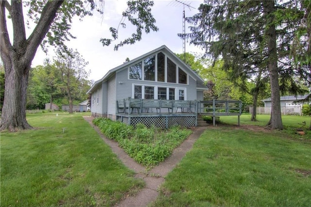 17174 59th Ave, Chippewa Falls, WI 54729 - rear view of property with a wooden deck and a yard