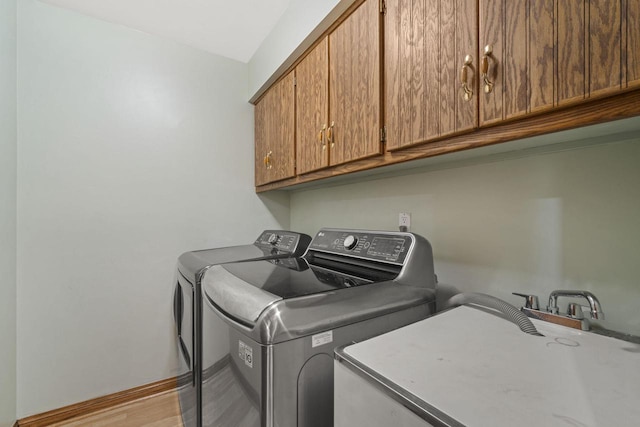 920 Oakwood Ln Unit C, Brookfield, WI 53045 - washroom with cabinet space and separate washer and dryer