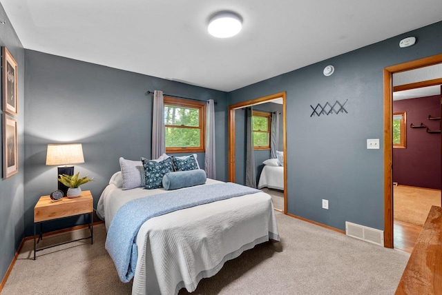 W188N10115 Maple Rd, Germantown, WI 53022 - carpeted bedroom with baseboards and a closet